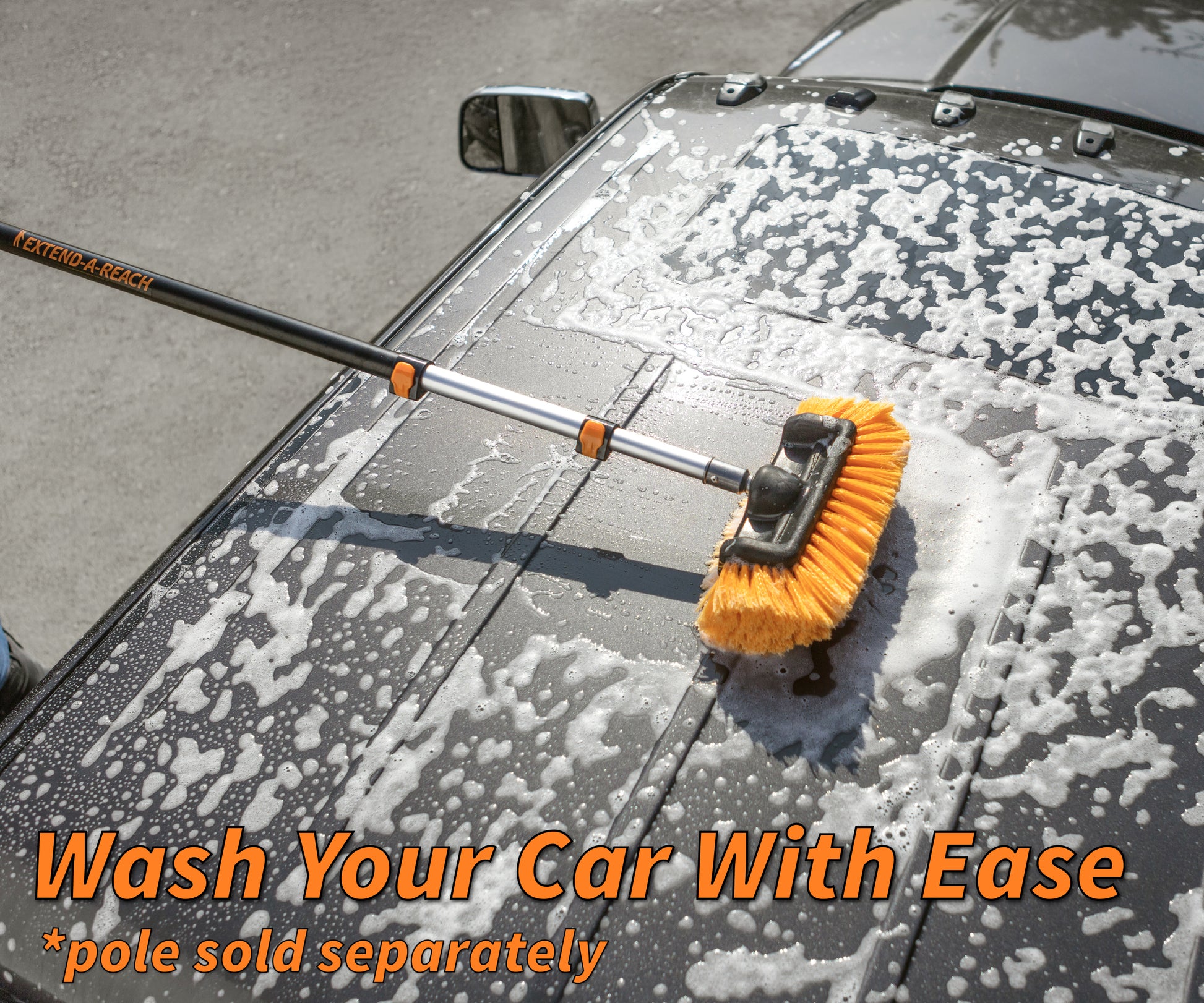 Extend-A-Reach soft bristle scrub brush with extension pole washing a car roof. Ideal for washing cars, trucks, RVs, and boats. Text: ‘Wash Your Car With Ease’.