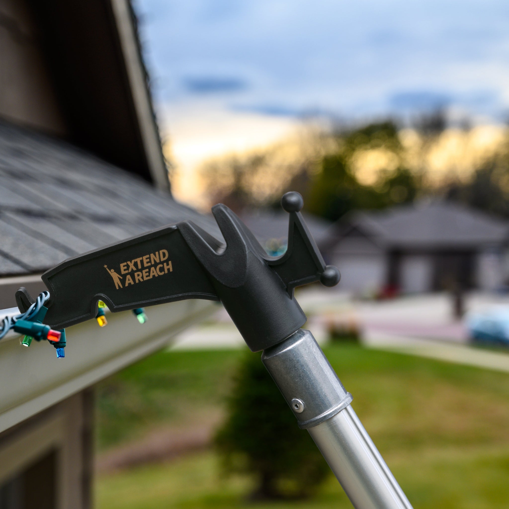 How to Hang Christmas Lights Without a Ladder This Holiday Season