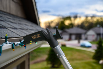 How to Hang Christmas Lights Without a Ladder This Holiday Season