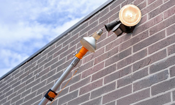 How to Use a Light Bulb Changer for High Ceilings Safely