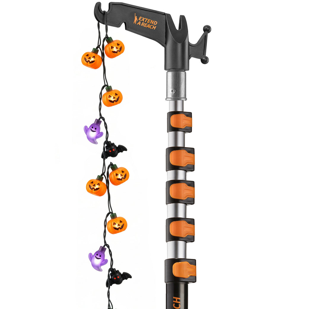 Extend-A-Reach 24 ft telescoping pole with utility hook, used to hang multicolor Halloween string lights safely from the ground